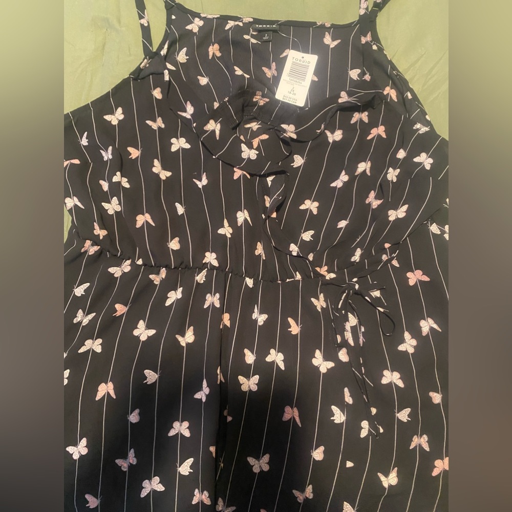 New with tags, black butterfly, print Torrid faux wrap top. - Picture 2 of 4